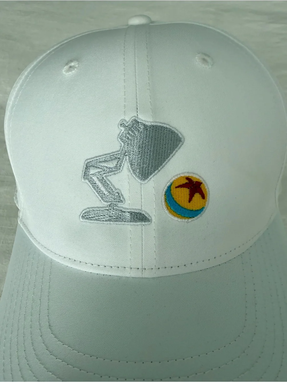 DISNEY Pixar Baseball Cap with Embroidered Luxo Lamp and Ball